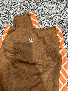 Crowned Athletics Animal Print Leggings Brown & Orange Like New
